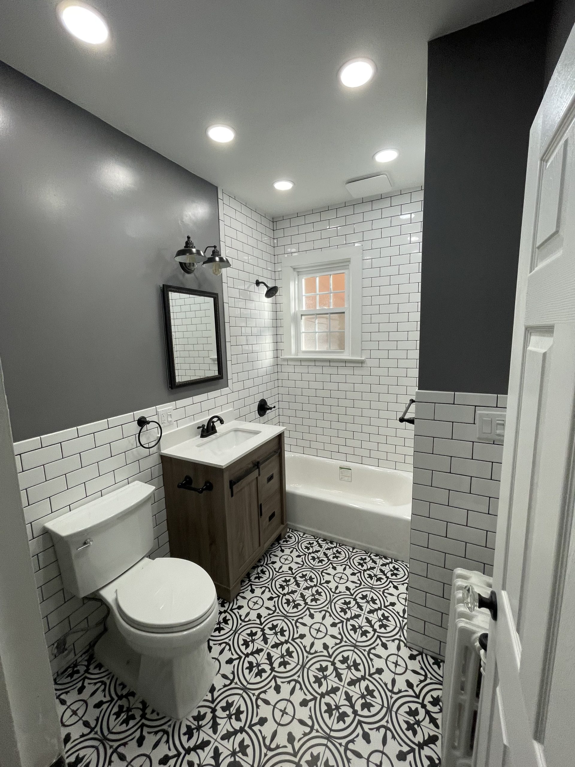 Finished bathroom remodel by Aberrant Builders in the Raleigh area